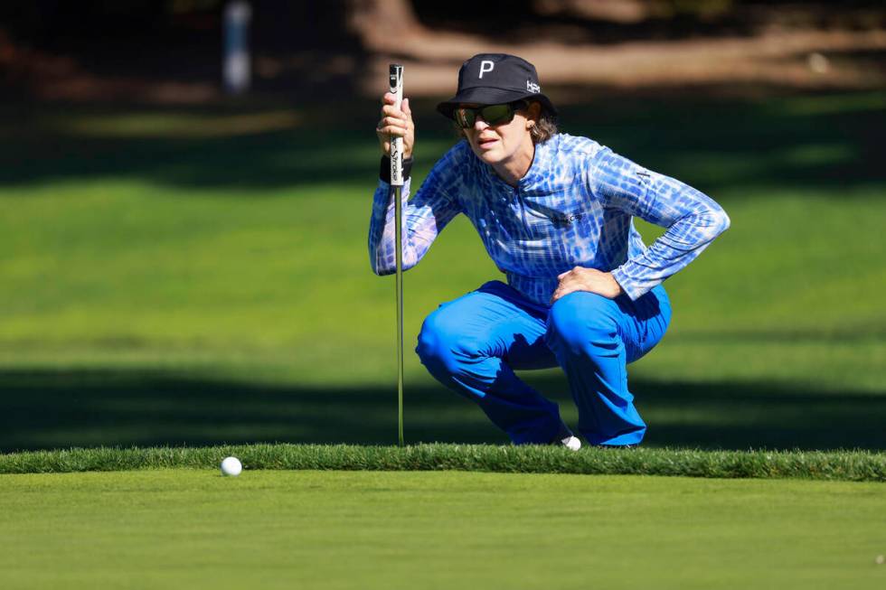 Ronda Henderson prepares to putt on the first green during her round of 16 match against Sarah ...