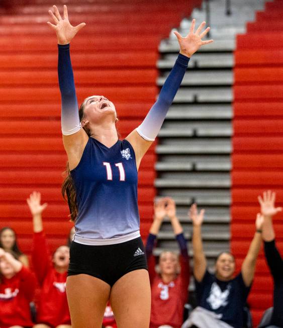 Coronado senior Reagan Vint (11) celebrates a point during the high school volleyball game agai ...