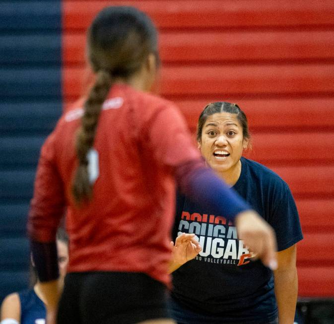 Coronado Head Coach Melody Nua talks to her players during the high school volleyball game agai ...