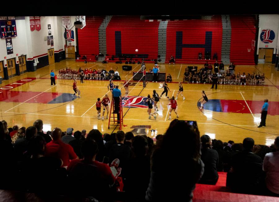 Fans watch the high school volleyball game between Liberty and Coronado at Liberty High School, ...