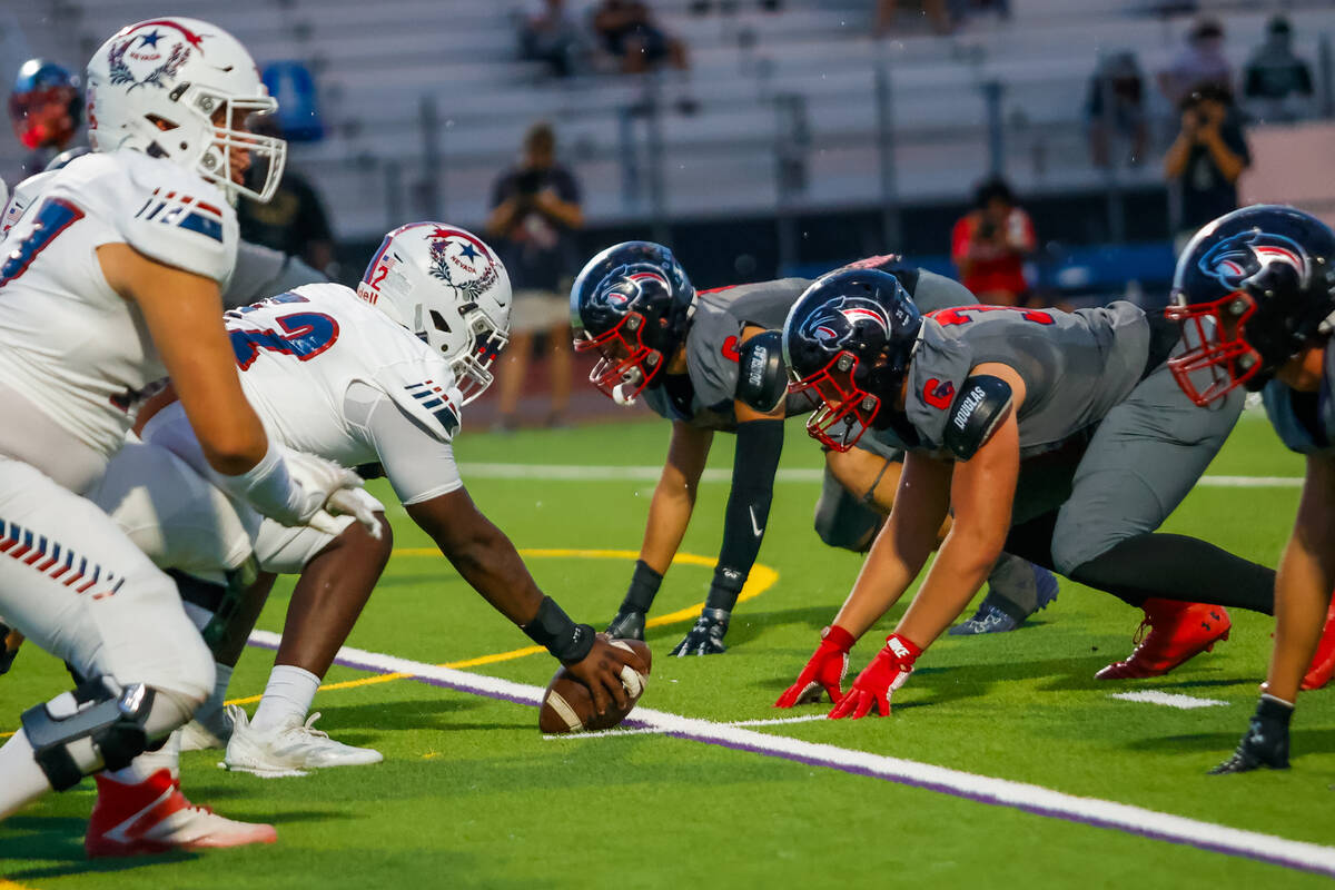 Coronado and Liberty players line up during a football game at Coronado High School on Friday, ...