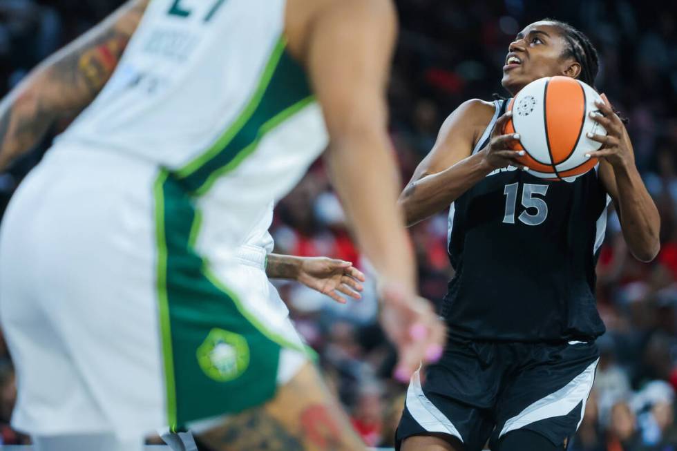 Aces guard Tiffany Hayes (15) drives the ball to the basket during game one of a WNBA playoff g ...