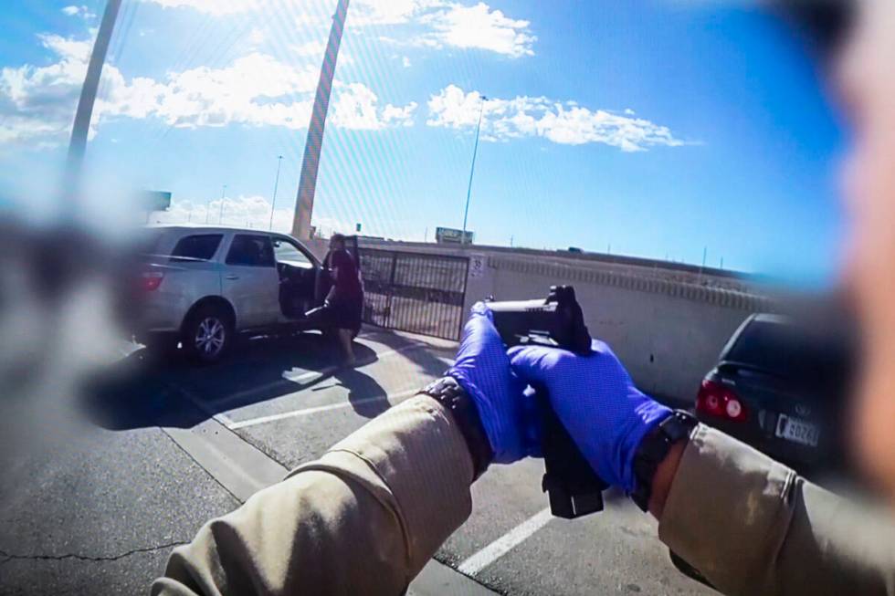 Body camera footage shows a Metro Police Department officer aiming their firearm at Kyle Norris ...