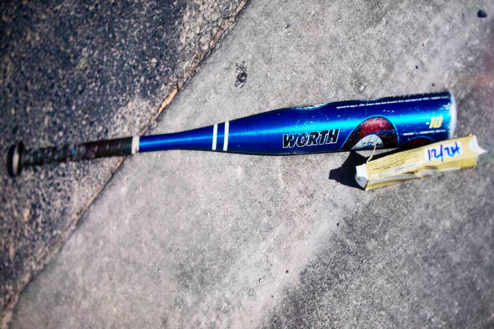 An image of Kyle Norris’ bat is shown during a press conference at the Metro Police Depa ...