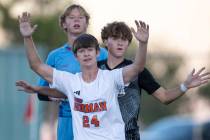 Bishop Gorman forward Alexander Rogers (24), Palo Verde defender Jaxon Law (2) and Palo Verde g ...