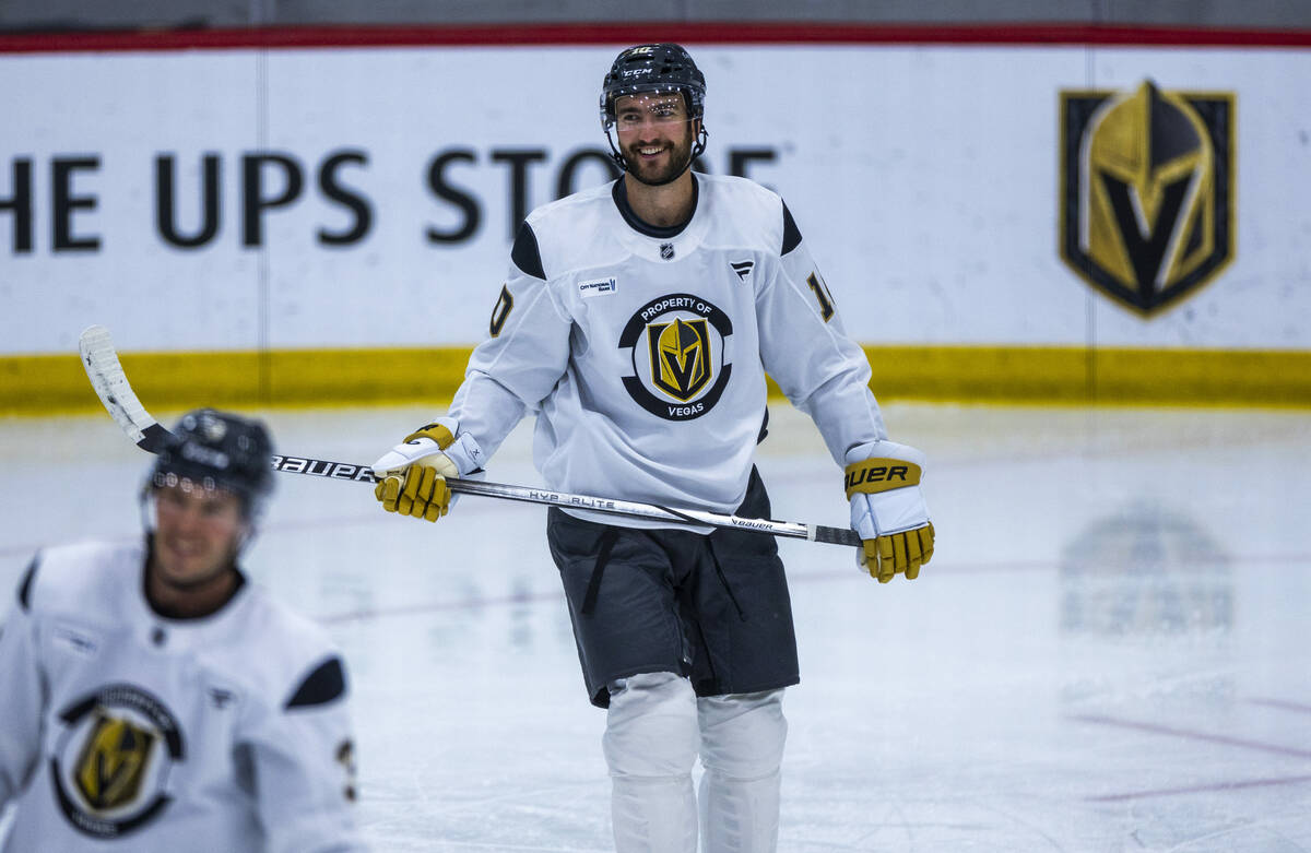 Golden Knights center Nicolas Roy (10) smiles at teammates during training camp at City Nationa ...