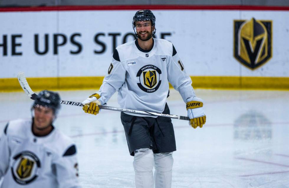 Golden Knights center Nicolas Roy (10) smiles at teammates during training camp at City Nationa ...