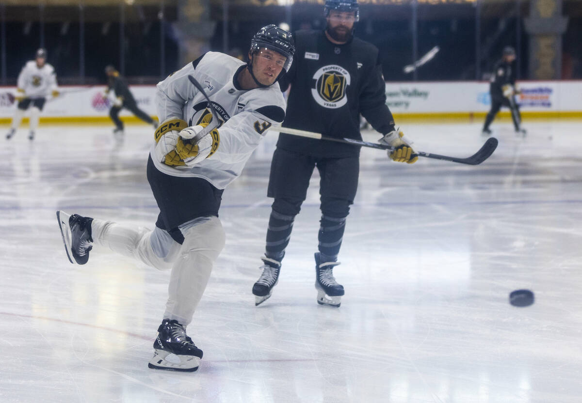 Golden Knights defenseman Brayden McNabb (3) takes a shot at the goal during training camp at C ...