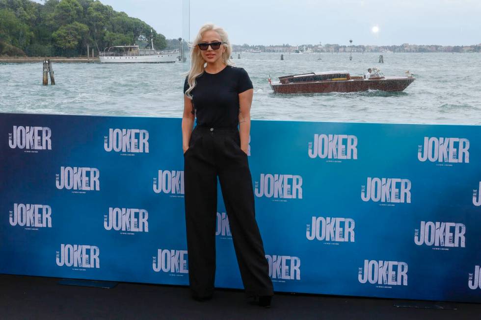 Lady Gaga poses for photographers at the photo call for the film 'Joker: Folie A Deux' at the h ...