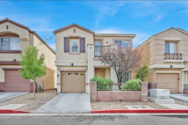 3614 American Pie Ct. is a two story home located in between Sun City Summerlin and Lone Mounta ...