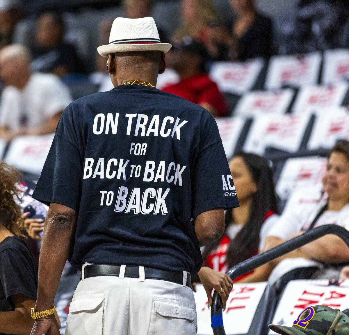 An Aces fan is feeling positive with his t-shirt message as they face the Seattle Storm in thei ...