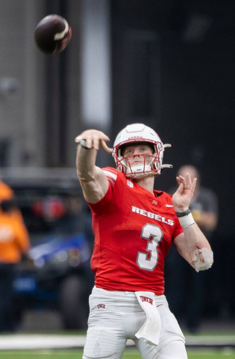 UNLV quarterback Matthew Sluka (3) passes the ball during the college football game against Uta ...