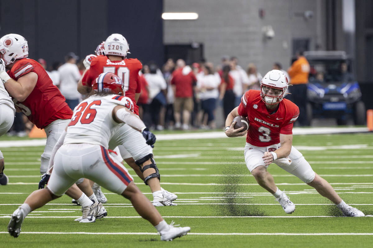 UNLV quarterback Matthew Sluka (3) runs with the ball during the college football game against ...