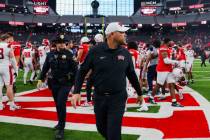 UNLV head coach Barry Odom exits the field following a 72-14 win over Utah Tech at Allegiant St ...