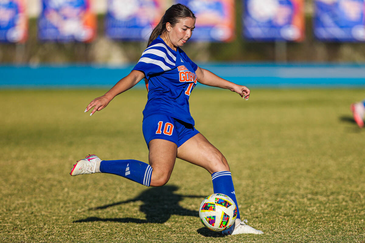 Bishop Gorman midfielder Stephenie Hackett (10) kicks a goal during a high school soccer game b ...