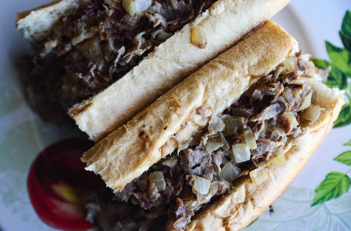 The Classic Philly Cheesesteak Sandwich a Liscio's roll tossed with chopped fried onion and top ...