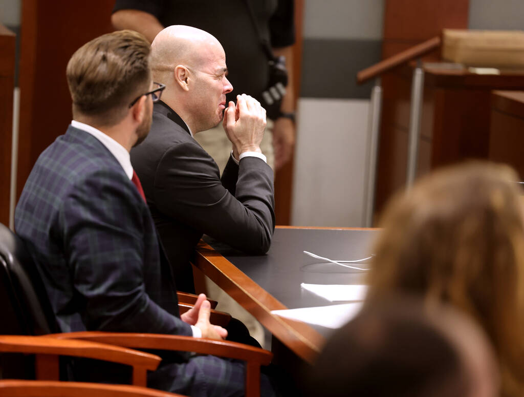 Robert Telles reacts as his wife Mary Ann Ismael talks on the witness stand during the penalty ...