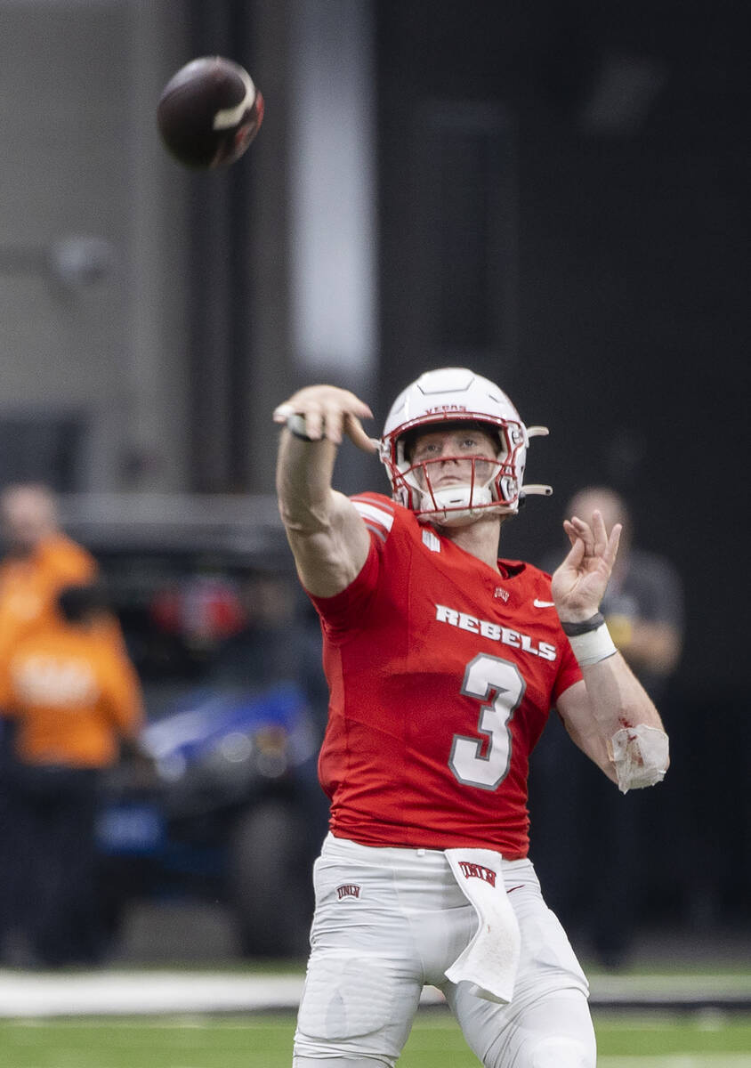 UNLV quarterback Matthew Sluka (3) passes the ball during the college football game against Uta ...