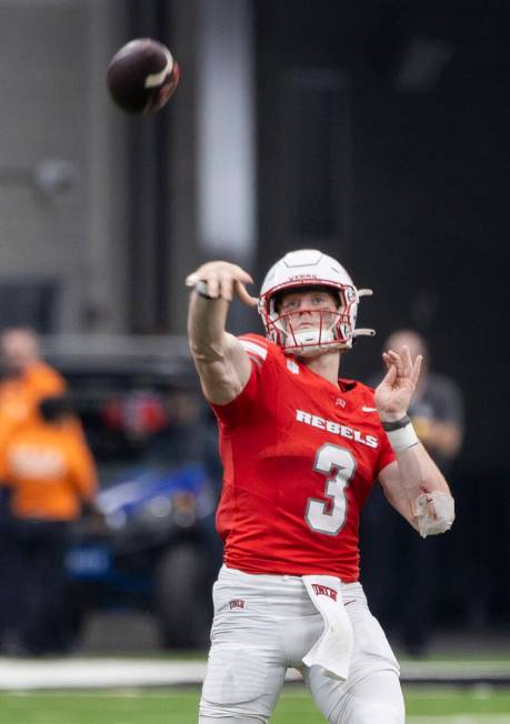 UNLV quarterback Matthew Sluka (3) passes the ball during the college football game against Uta ...