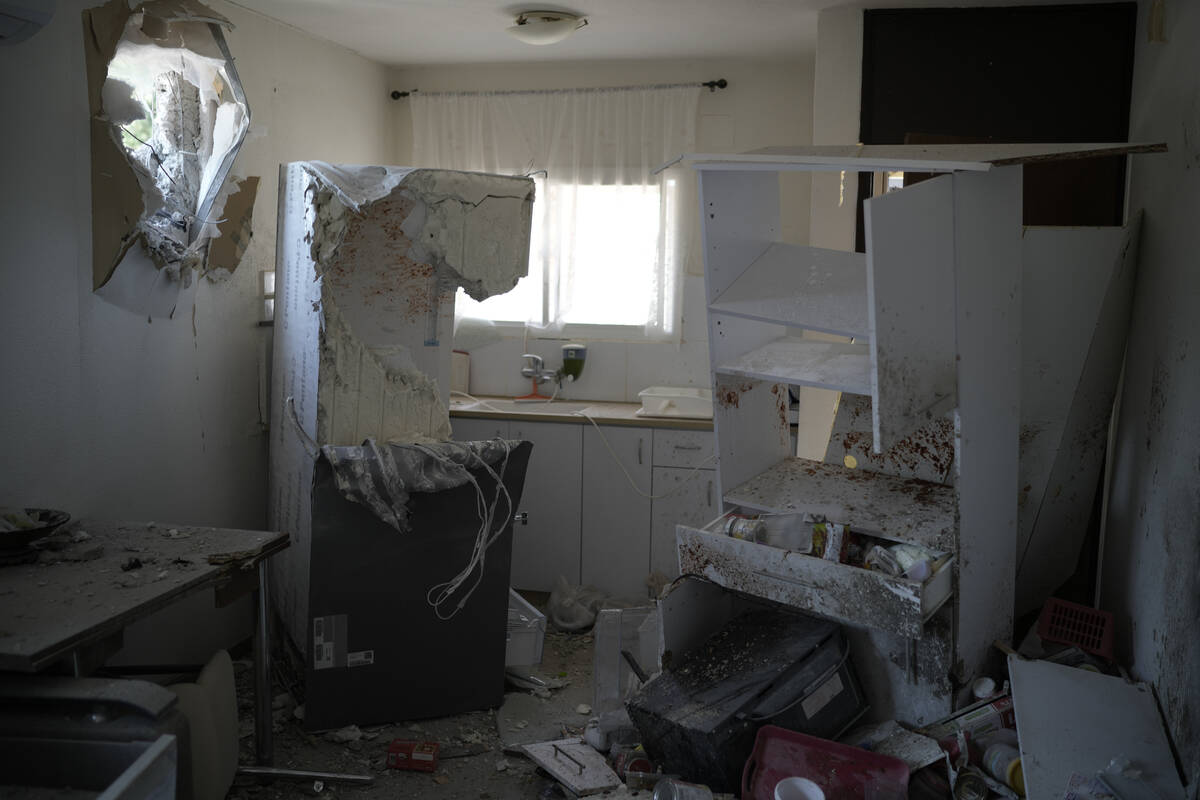 A damaged house that was hit by a rocket fired from Lebanon, near Safed, northern Israel, on We ...