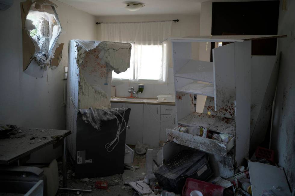 A damaged house that was hit by a rocket fired from Lebanon, near Safed, northern Israel, on We ...