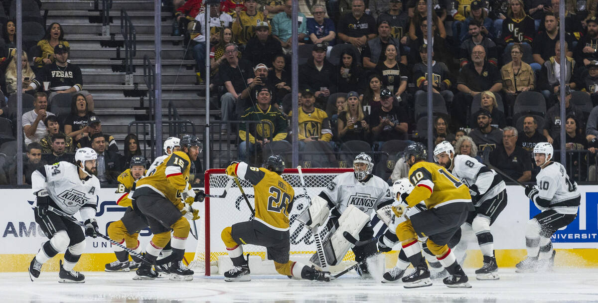 Golden Knights right wing Alexander Holtz (26) takes a shot on Los Angeles Kings goaltender Dar ...