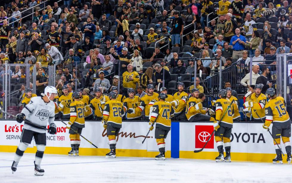 Golden Knights players celebrate the first goal against the Los Angeles Kings during the secon ...