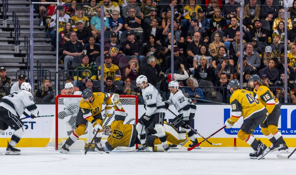 Golden Knights goaltender Ilya Samsonov (35) dives to cover the net after a shot by Los Angele ...