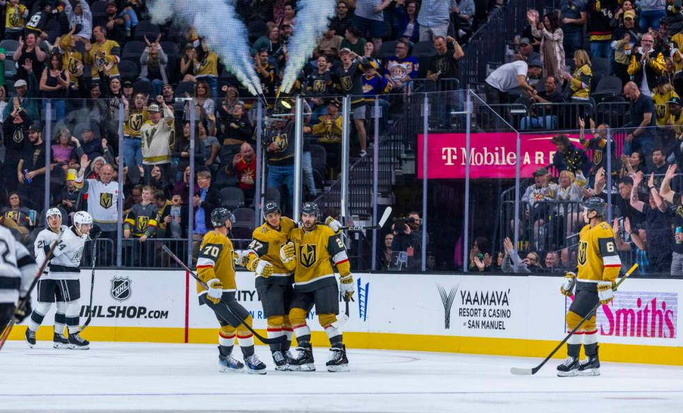 The Golden Knights celebrate a score against the Los Angeles Kings during the third period of t ...