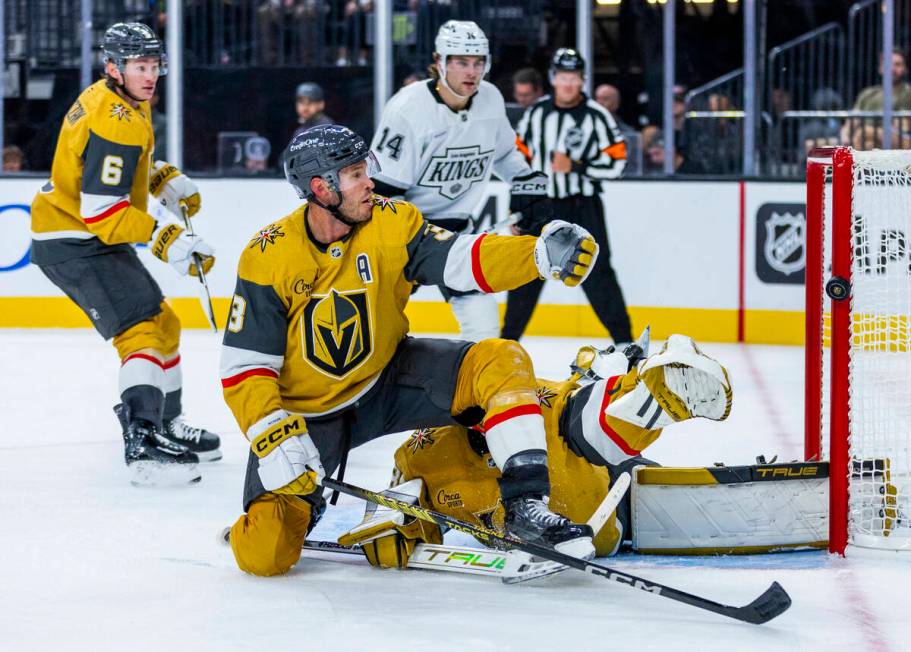 Golden Knights defenseman Brayden McNabb (3) and goaltender Ilya Samsonov (35) watch a shot hit ...