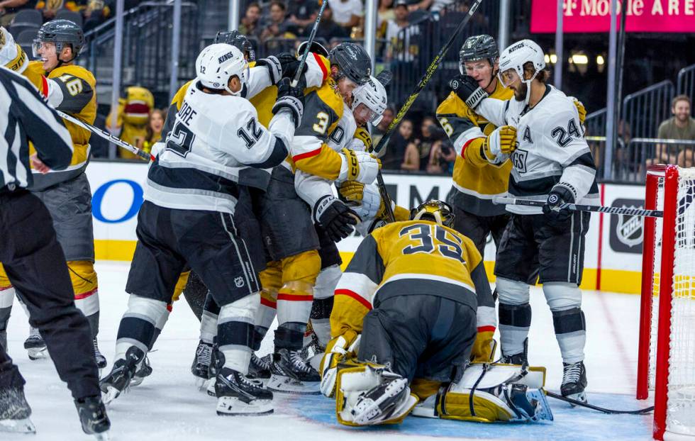 Golden Knights and Los Angeles Kings players scrap as Golden Knights goaltender Ilya Samsonov ( ...