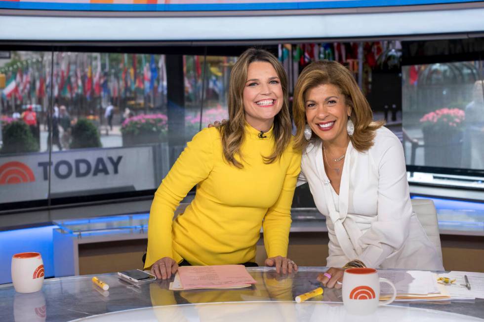 Co-anchors Savannah Guthrie, left, and Hoda Kotb pose on set of the "Today" show at NBC Studios ...