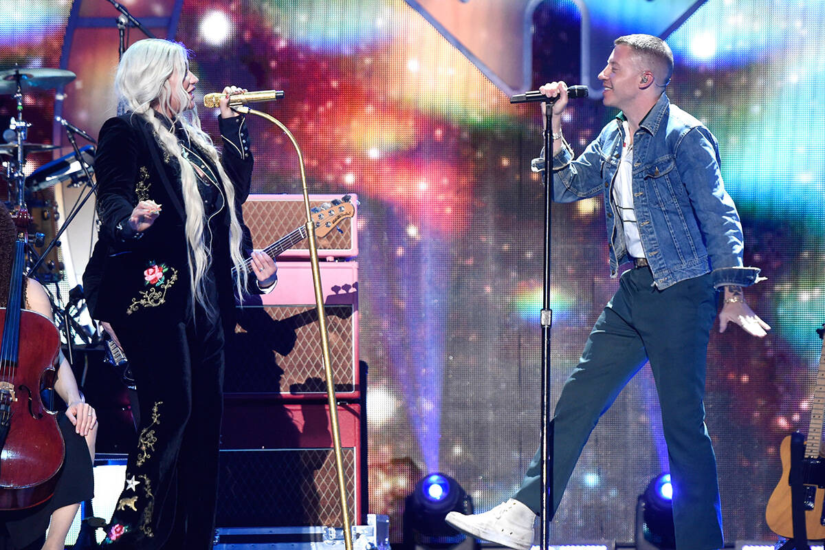 Kesha, left, and Macklemore perform onstage during the 2017 iHeartRadio Music Festival at T-Mob ...