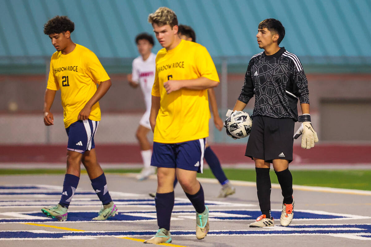 Shadow Ridge goalkeeper Tony Delcid (right) looks out at the field before throwing the ball bac ...