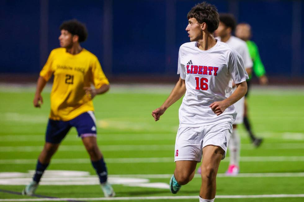 Liberty forward Tomas Montano (16) runs up the field during a throw-in from a teammate during a ...