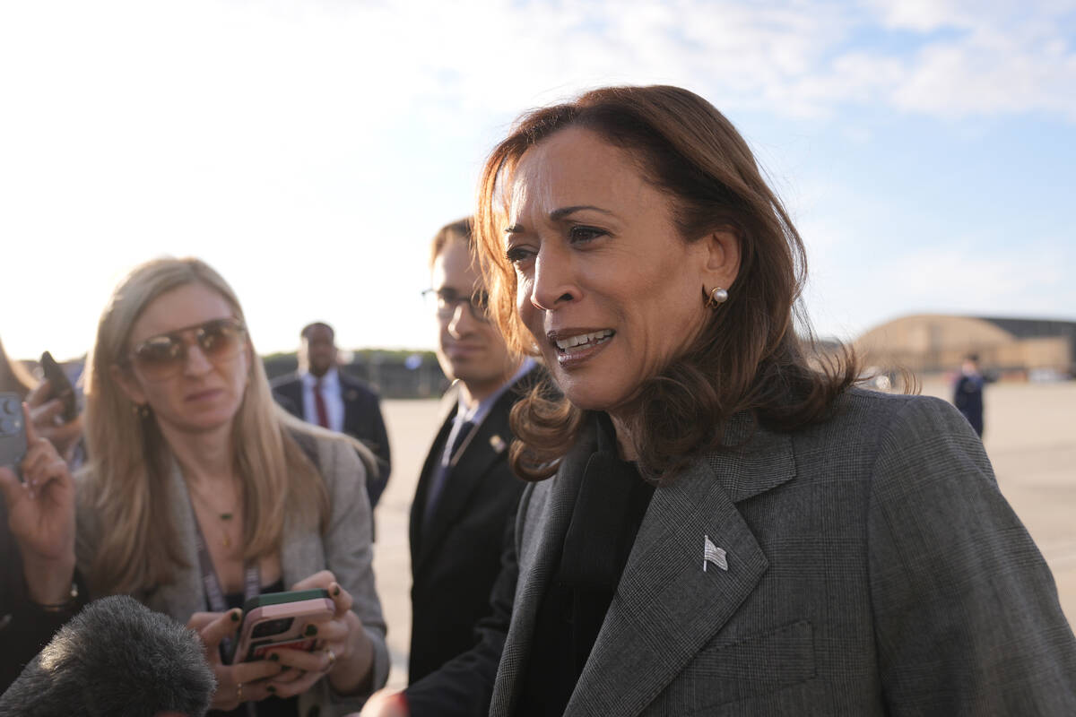 Democratic presidential nominee Vice President Kamala Harris speaks to members of the media upo ...