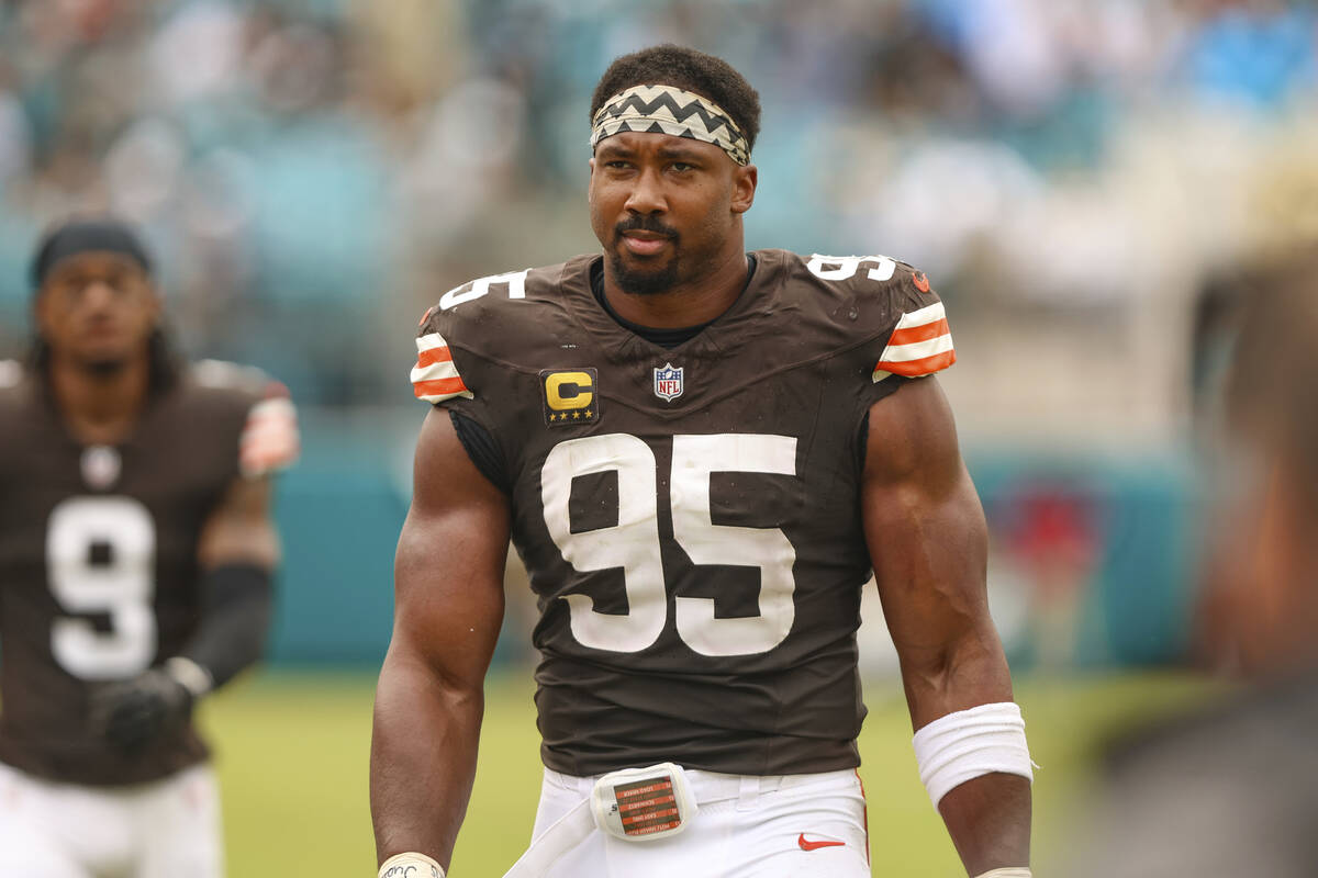 Cleveland Browns defensive end Myles Garrett (95) walks the sideline during an NFL football gam ...