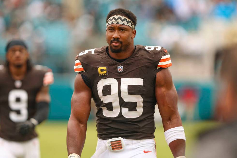 Cleveland Browns defensive end Myles Garrett (95) walks the sideline during an NFL football gam ...