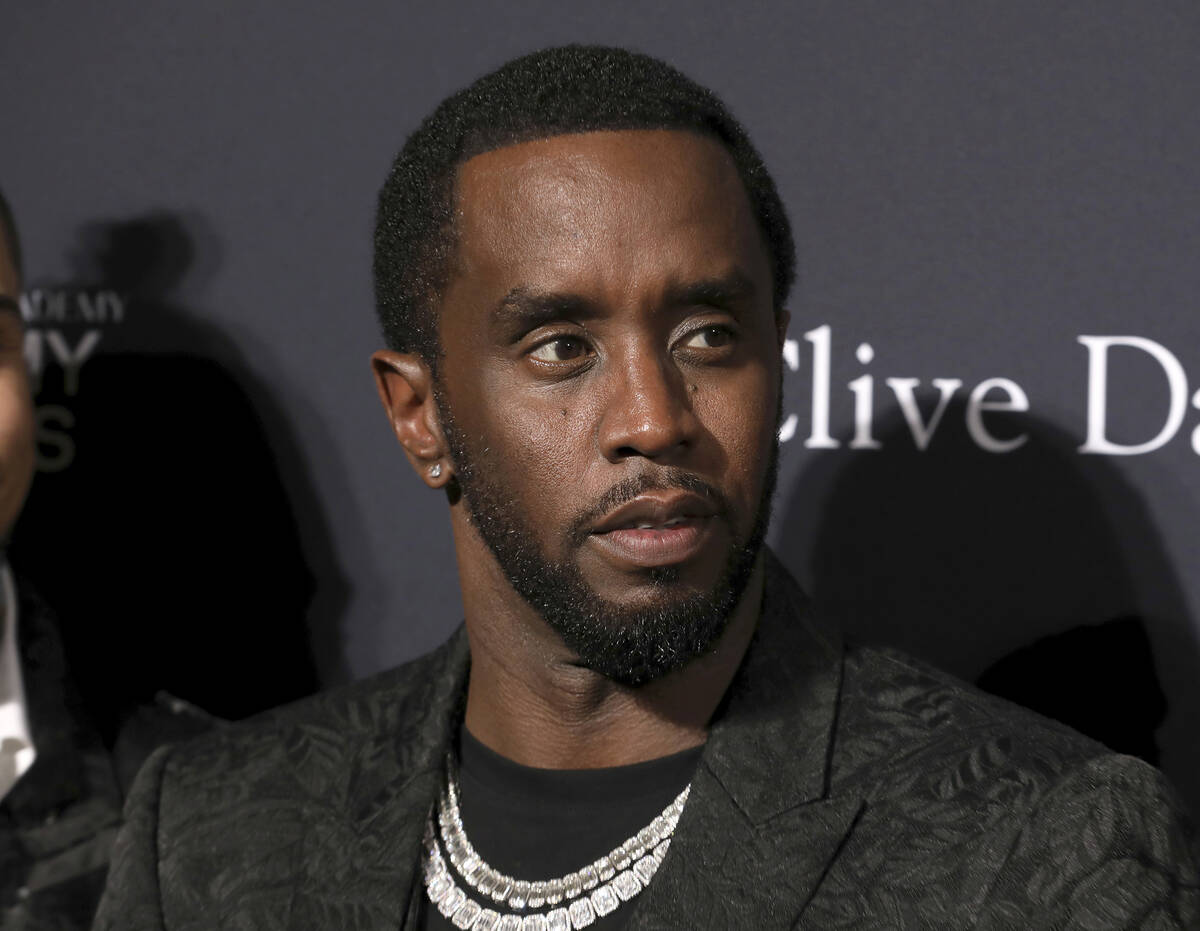 Sean Combs arrives at the Pre-Grammy Gala And Salute To Industry Icons at the Beverly Hilton Ho ...