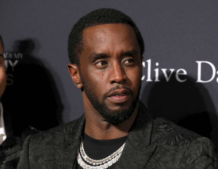 Sean Combs arrives at the Pre-Grammy Gala And Salute To Industry Icons at the Beverly Hilton Ho ...