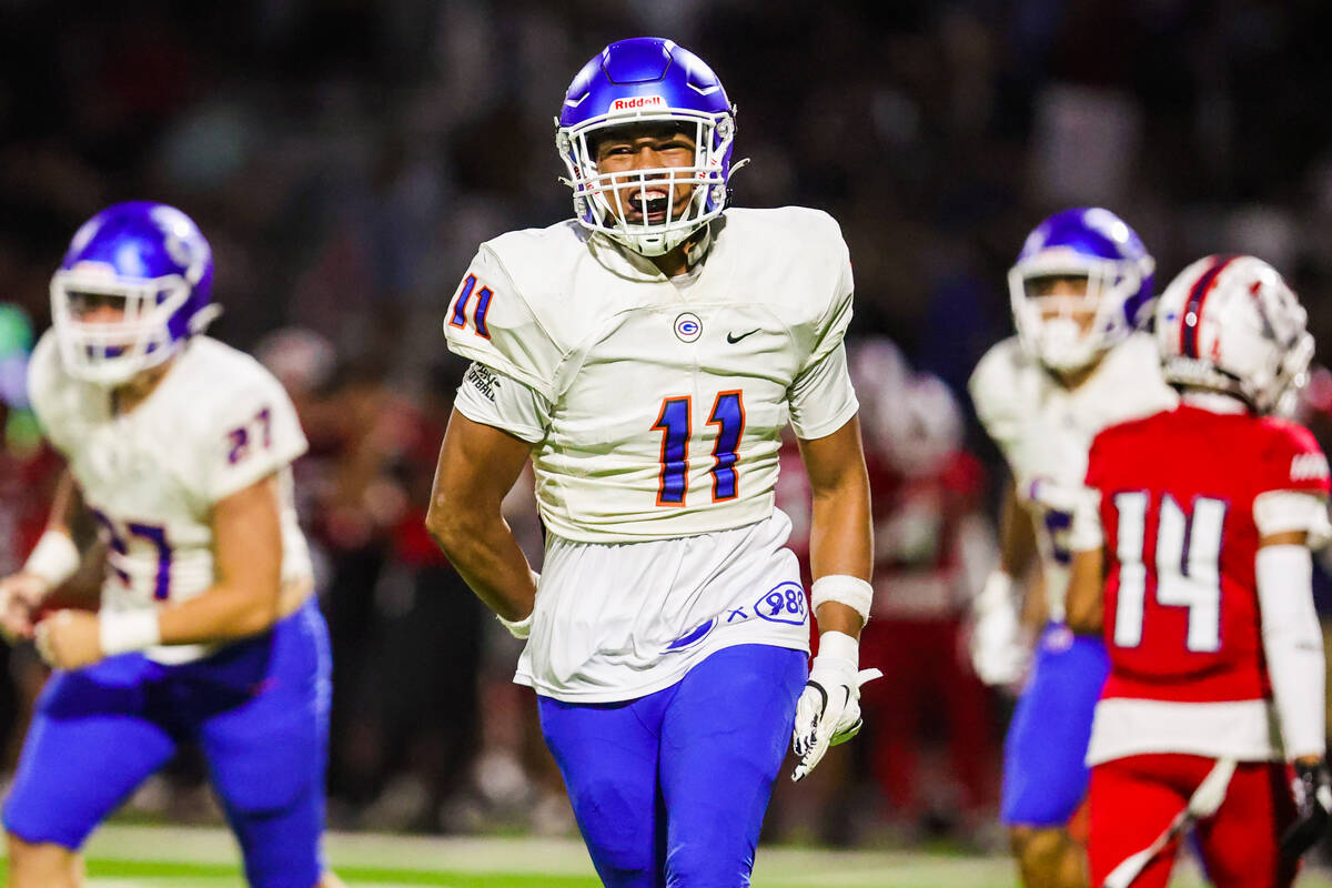 Bishop Gorman linebacker Landon McComber celebrates an interception by Gorman during a high sch ...