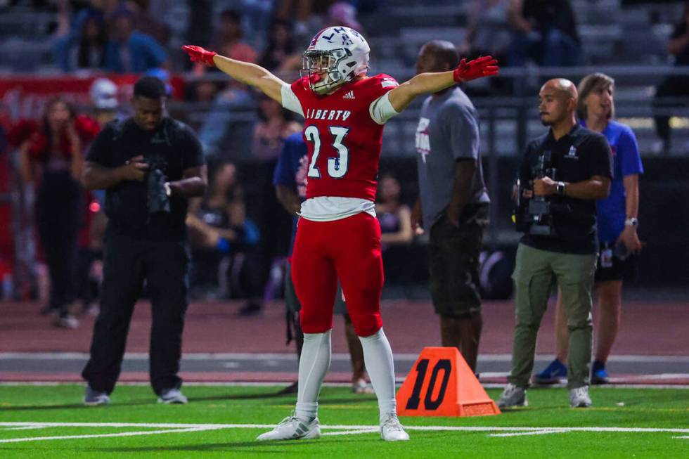 Liberty defensive back Seleva’atielu Alofipo (23) celebrates forcing an incomplete pass ...