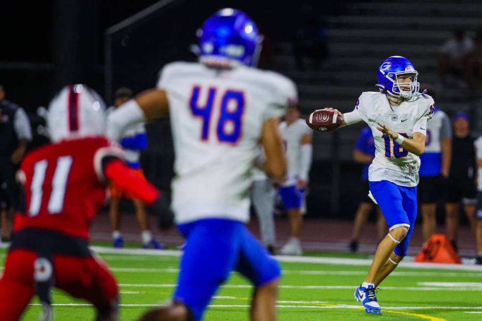 Bishop Gorman quarterback Granville-Fox Hogan (18) runs the ball during a high school football ...