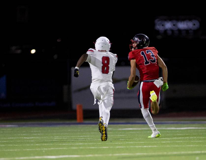 Coronado wide receiver Scott "Bubba" Holper (13) looks back one more time before scor ...