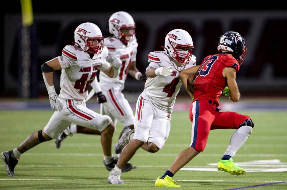 Arbor View senior Vicentico Pringle (4) looks to tackle Coronado wide receiver Scott "Bubb ...