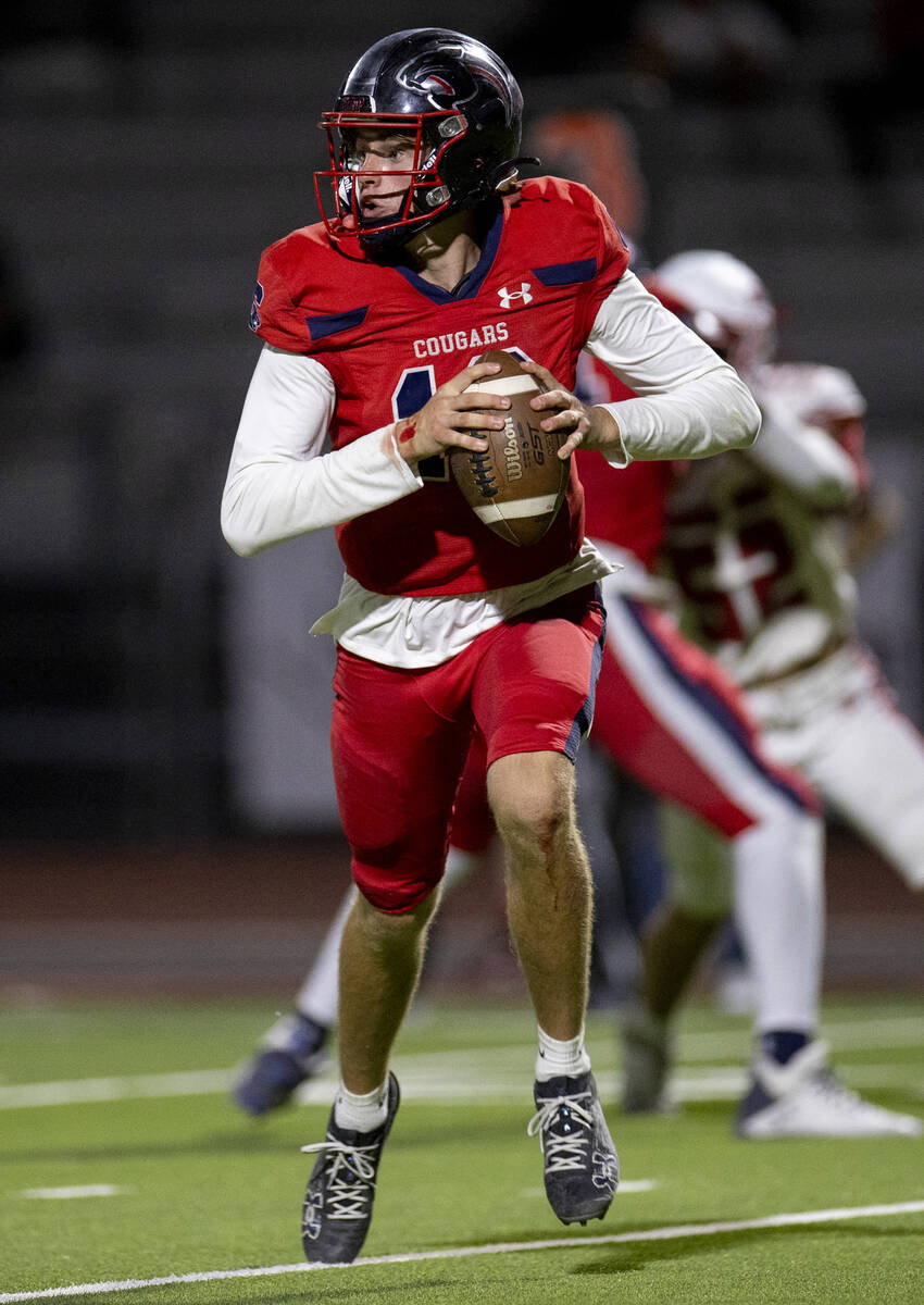 Coronado quarterback Aiden Krause (10) looks for a receiver during the high school football gam ...