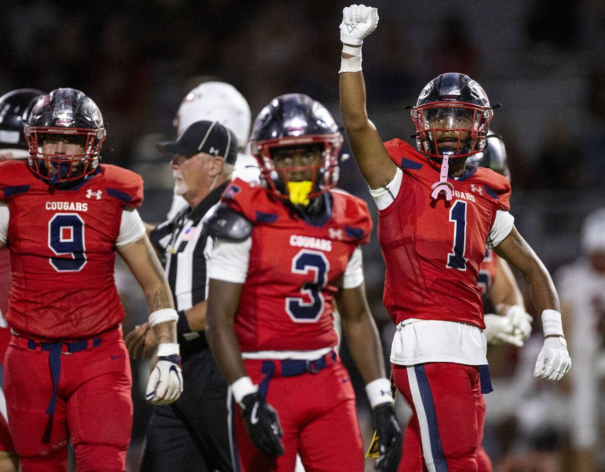 Coronado senior Marquesion Floyde (1) celebrates during the high school football game against A ...