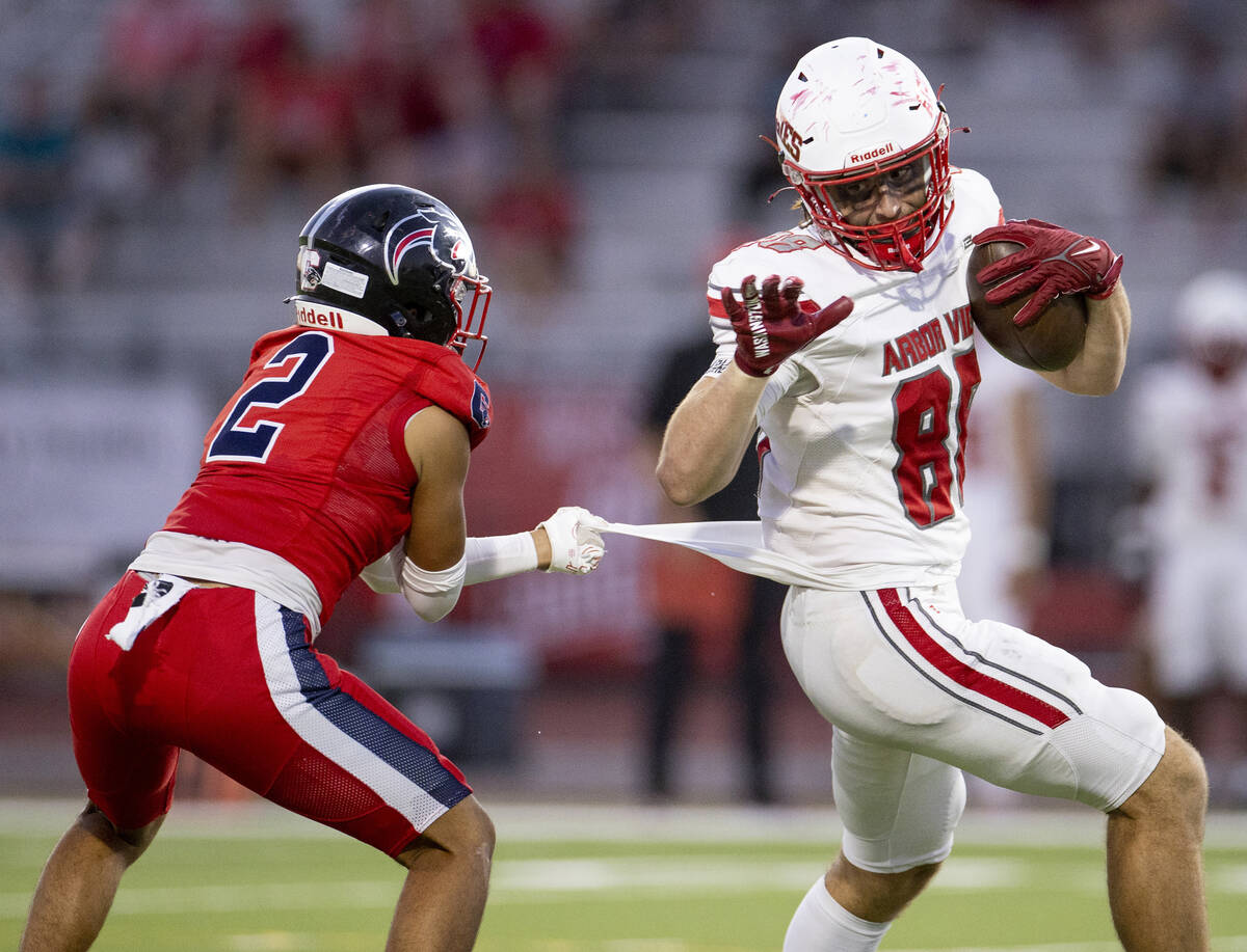 Arbor View tight end Zac Fares (88) avoids Coronado defensive back Isaiah Colbert (2) during th ...