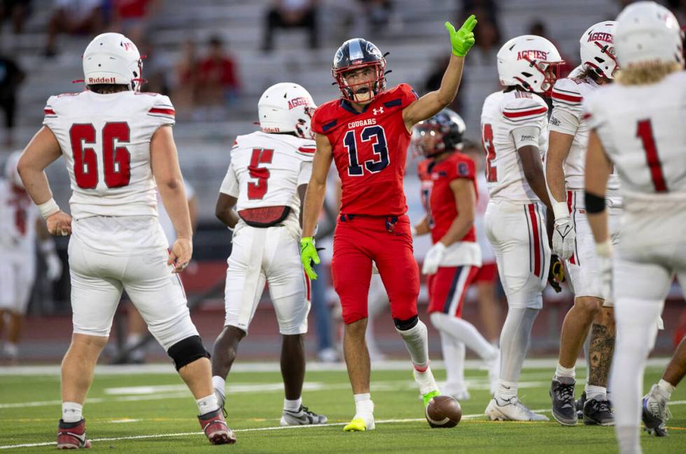 Coronado wide receiver Scott "Bubba" Holper (13) points after making a first down dur ...