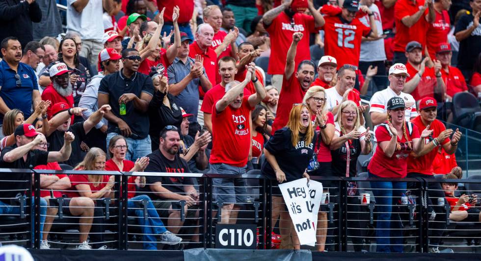 UNLV fans cheers another score against the Fresno State Bulldogs during the first half of their ...